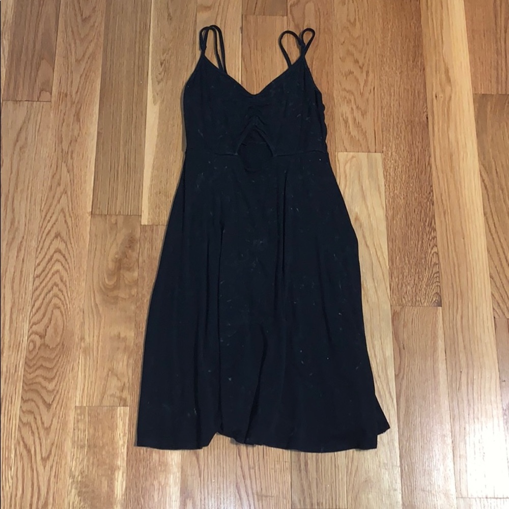Black dress with white splatters and cutout